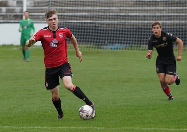 Leif Davies on the attack for Morecambe Under 18s.