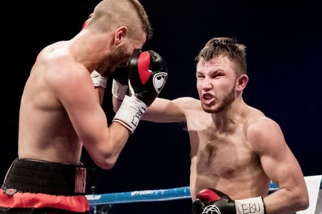 Isaac Lowe goes on the attack during his European title challenge against Dennis Ceylan.