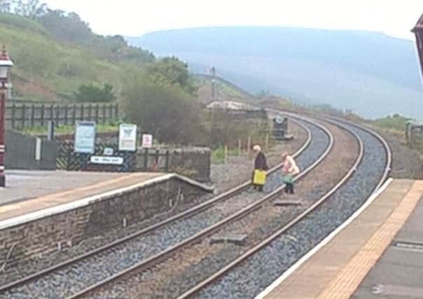 British Transport Police Lancs tweeted a warning about crossing railway tracks after two in their 70s did so at Garsdale, Cumbria.