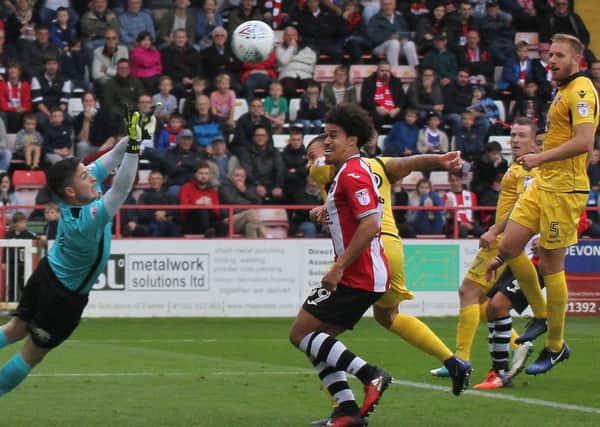 Morecambe go close on day to forget at Exeter.