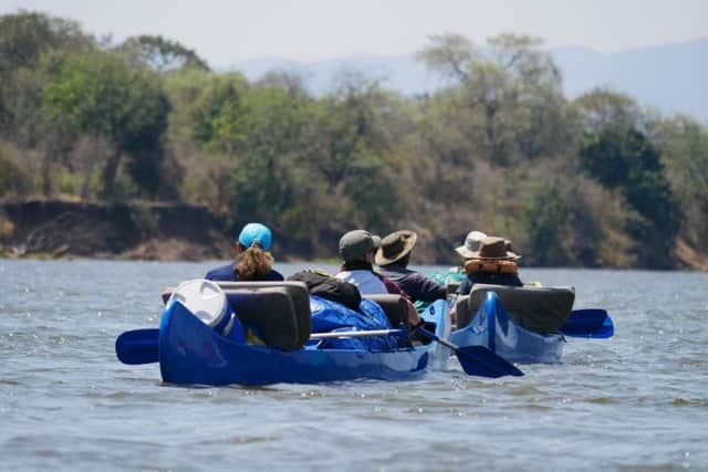 Canoes on the Zambezi during Anita Lowis's charity canoe trip.