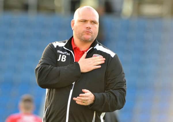 Jim Bentley salutes the Morecambe fans at the final whistle. Picture: B&O Press Photo