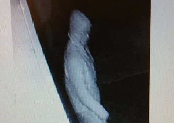 CCTV image issued by police after burglary at Whitefield Place in Morecambe.