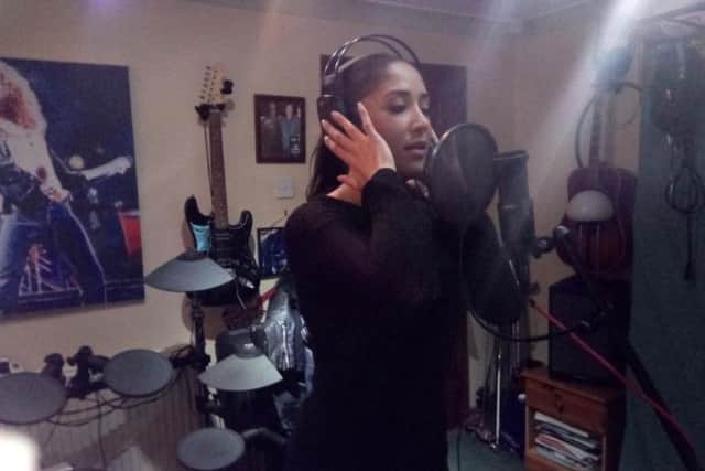 Natasha Bates recording vocals for the charity single for Team Reece.