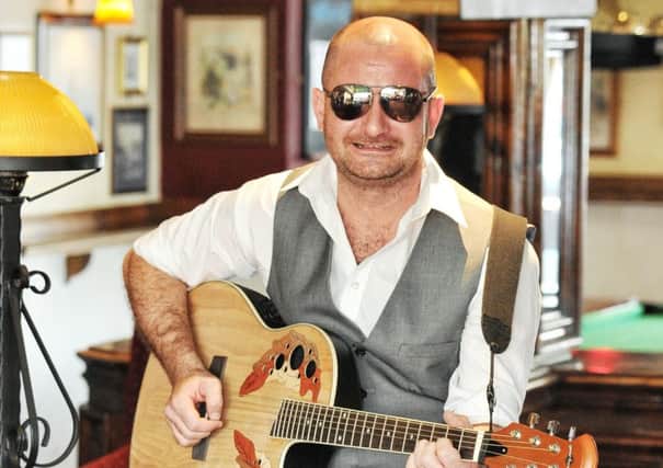 Dominic Clayton performing at a family fun day at the The Duke Of Rothesay, Heysham, Morecambe in August. Photo by Julian Brown.
