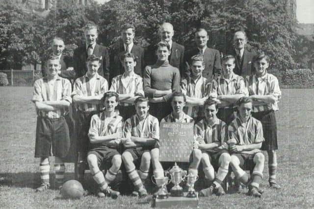 Freehold United 1948-49 pictured on the Far Moor, their home ground. The gentlemen on the back row cannot be identified except to say the secretary of the club was Mr T Taylor and I imagine he is one of the six gentlemen present. Front row from left, Simpson, Frank Parkinson, Ken "Topsy" Irvine (captain), Keenan, Jack "Tiger" Wilkinson.  Middle row from left: Myerscough, Baines, Simpson, Ray Troughton, Crane, Parkinson, uknown.