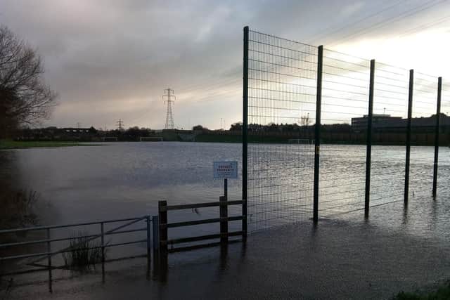 A playing field next to The Bay Gateway close to Lancaster and Morecambe College under water on Thursday morning.