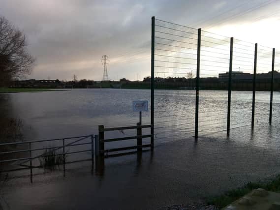 A playing field next to The Bay Gateway close to Lancaster and Morecambe College under water on Thursday morning.