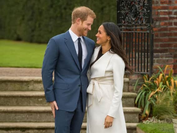Prince Harry and Meghan Markle in the Sunken Garden at Kensington Palace, London