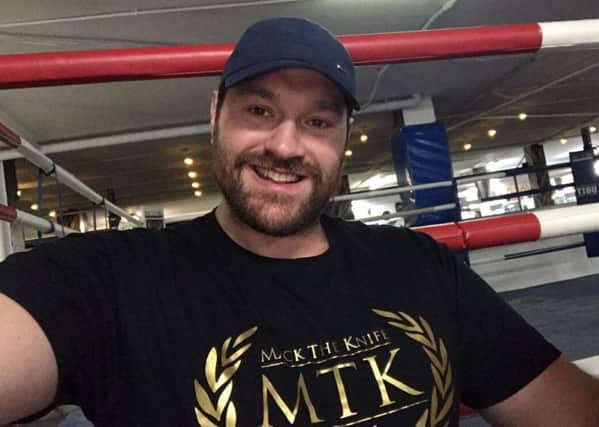 Tyson Fury signs with MTK Global.