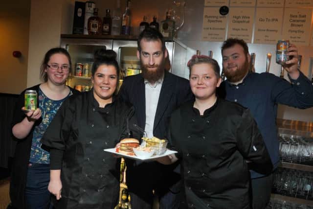 LANCASTER    11-12-17
A new beer and burger bar, 75 Church Street, has opened in Lancaster centre, from left, Becky Dale, Caitlin Walton, owner Mark Cutter, Loren Nott and Matthew Fitzwilliam.