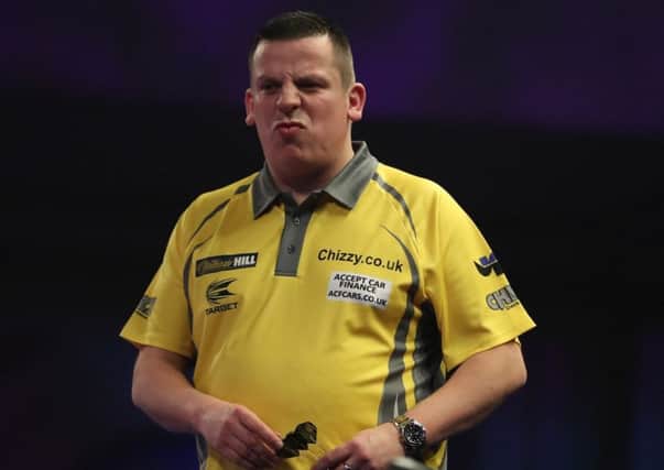 Dave Chisnall rues a missed opportunity in his defeat to Vincent van der Voort. Picture: Lawrence Lustig/PDC