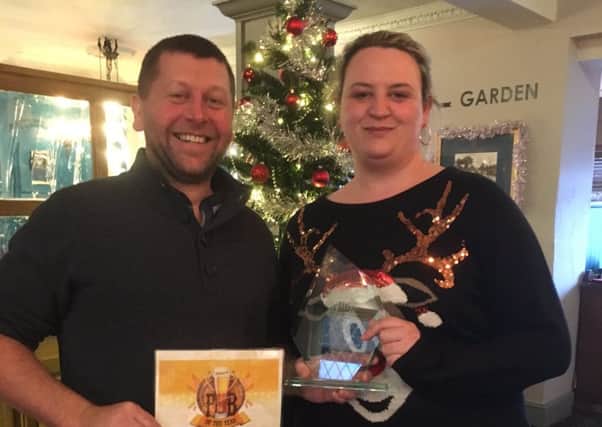 Winners of The Pub of the Year for the Lancaster Guardian. Pictured are landlord  Anthony Rooker and  member of bar staff Louise Beaumont.