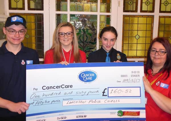 From left James Hoyle, Lizzie Porter, Jane Porter and Bethany Pitt hand over the cheque for Â£160.52 for CancerCare at Slynedales in Lancaster.