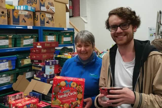 Foodbank manager Annette Smith with Morecambe musician Joe McCorriston at the foodbank