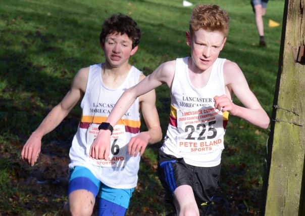 Lukas Eichmeyer and Rhys Ashton (225) in the U15 boys' race.