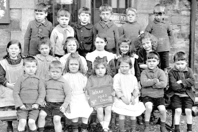 Wray School pupils, Class Three, 1922. 
Back row from left, C Beagley, Roy Dixon, Arthur Townley, William Stephenson, Victor Stephenson, Cyril Thistlethwaite. 
Middle row from left, A Atkinson, Clara Clarkson, Olive Taylor, Doris Lawson, N Batty, Marjorie Askew. 
Front row from left, John Hodgson, Alan Robinson, Dot Kay, Joan Askew, Mary Jane Batty, Jimmy Stephenson, Sidney Clarkson.
The girl second from the left middle row is Clara Elizabeth Barton (nee Clarkson). 
Clara, who lived in Lancaster, passed away in 2016 aged 104. 
Clara was the younger sister of Ruth Whittam (nee Clarkson) who lived in Wray all her life and was the oldest person in the village when she passed away in 2015 also aged 104.