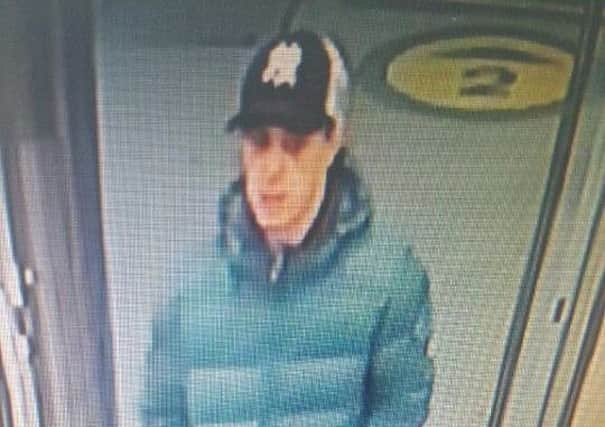 Police want to speak to this man in connection with a theft from Lancaster bus station.