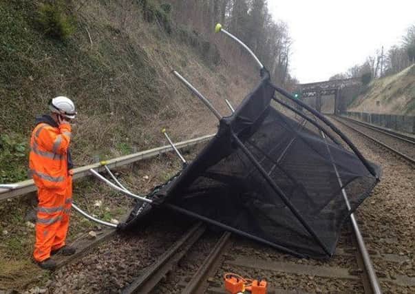 A trampoline which was blown onto the railway track.