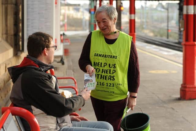 Photo Neil Cross
Jenny Dighton, volunteer and branch director, of Samaritans in Lancaster marking Blue Monday at Lancaster train station