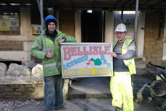 Workmen William Howard  and Trevor Horn, working for Heysham Demolition and Plant Hire.