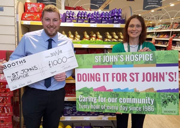 Booths, Kendal, Trading Manager, Jonathan Metcalfe and St Johns Hospice Community Fundraiser Sara Brown.