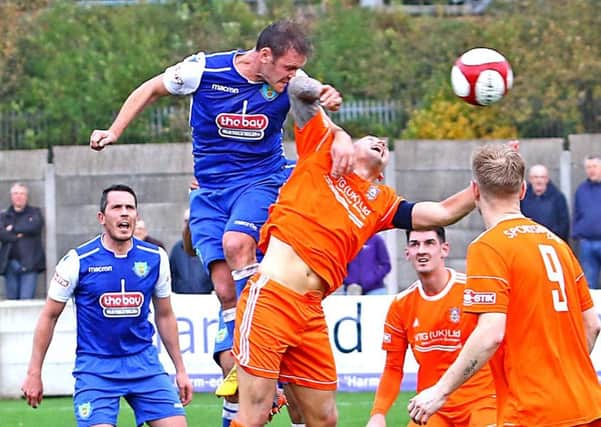 Ricky Mercer scored twice for Lancaster City in their win at Coalville Town.