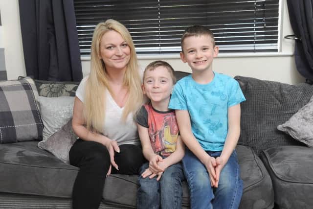 5-year-old Reilly McCarthy, pictured with mum Justine and brother Carter.