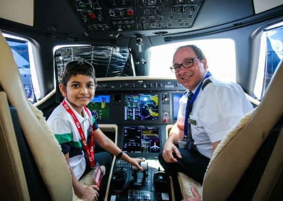 A child in the cockpit of a plane in Singapore.