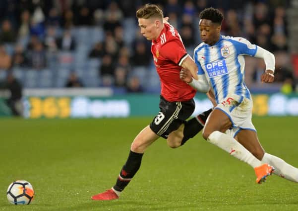 Scott McTominay in action against 
Huddersfield Town