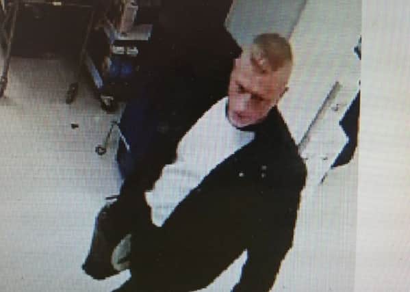 Police would like to know the identity of this man in relation to a shoplifiting offence at Boots, Lancaster.