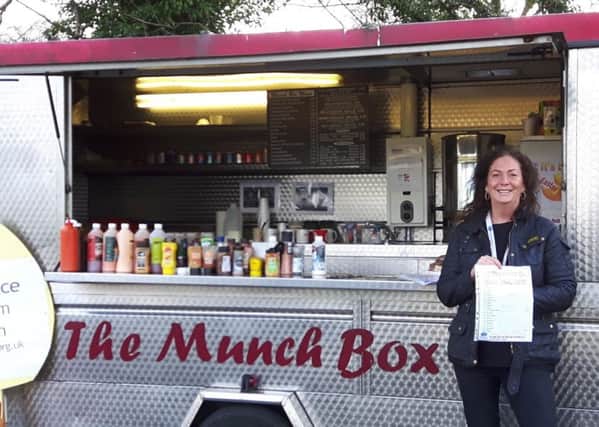 Go quackers at CancerCare's  fun duck race in Carnforth. Pictured is community fundraiser Helen Hartin at The Munch Box catering van where tickets are on sale.