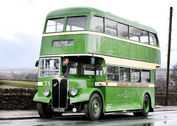 Darren Hunt on the restored Morecambe bus. Picture: Lorne Campbell.