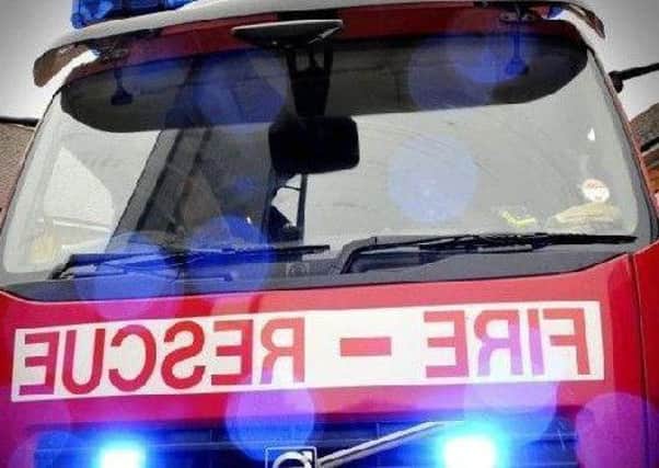 Fire crews rescue man from Morecambe garage fire.