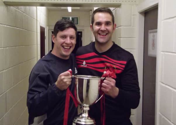 Garstang manager Lee Baker and assistant Neil Beesley celebrate Richardson Cup success