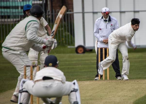 Fayaz Ughradar bowls for Garstang in the win at Morecambe			          Picture: Tim Gilbert