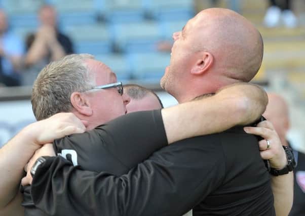 Morecambe boss Jim Bentley celebrates staying in the Football League   Picture: B&O PRESS PHOTO