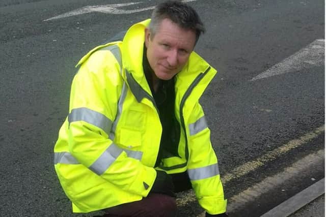 William Maxwell, service development manager, with the plastic kerb in Ribbleton.