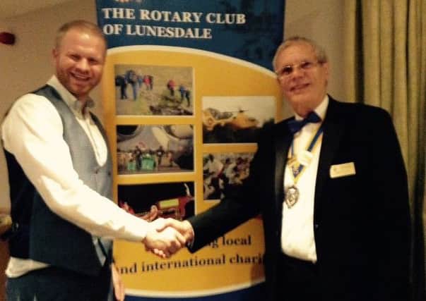 Rotary Club of Lunesdale President Nigel Pullen with Sam Boatwright.