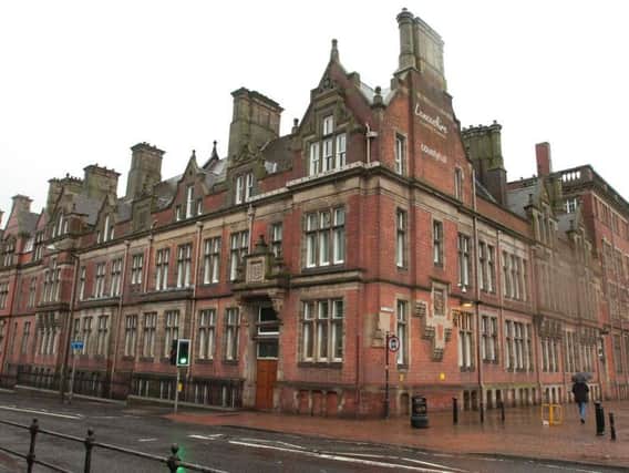 Four people are on police bail in relation to a long-running investigation over One Connect contracts at Lancashire County Council