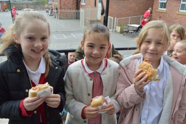 Children from Sandylands Primary School enjoyed free bacon butties as part of a new initiative sponsored by Yess Electrical to tackle child poverty.