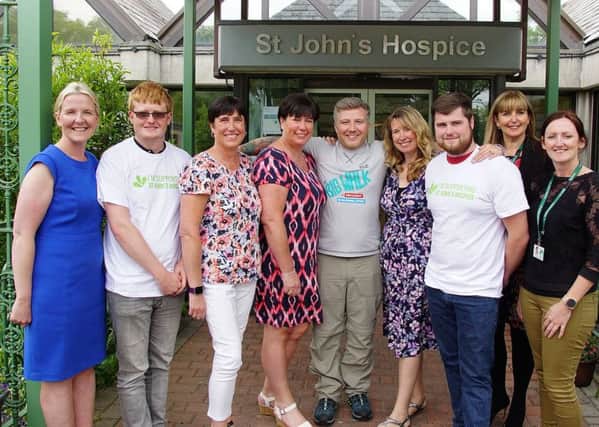 The big walk launch at St John's Hospice.  Michael Conlon  (centre) withHelen Holl, Karen Birchall and Dawn Edmondson and  some of the St Johns team.
