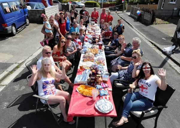 Residents and neighbours of Londonderry Road, Heysham, got together for a street party to celebrate the royal wedding of Prince Harry and Meghan Markle. Getting the party started. Picture by Paul Heyes, Saturday May 19, 2018.