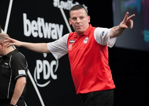 Dave Chisnall in action for England in Frankfurt. Picture: Kelly Deckers/PDC
