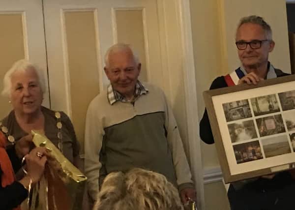 Lesley Simon, President of the Carnforth and District Twinning Association presented her counterpart from Sailly, Rachida Bounoua, together with the Mayor of Sailly, Jean-Claude Thorez, with a commemorative framed picture depicting scenes of Carnforth.